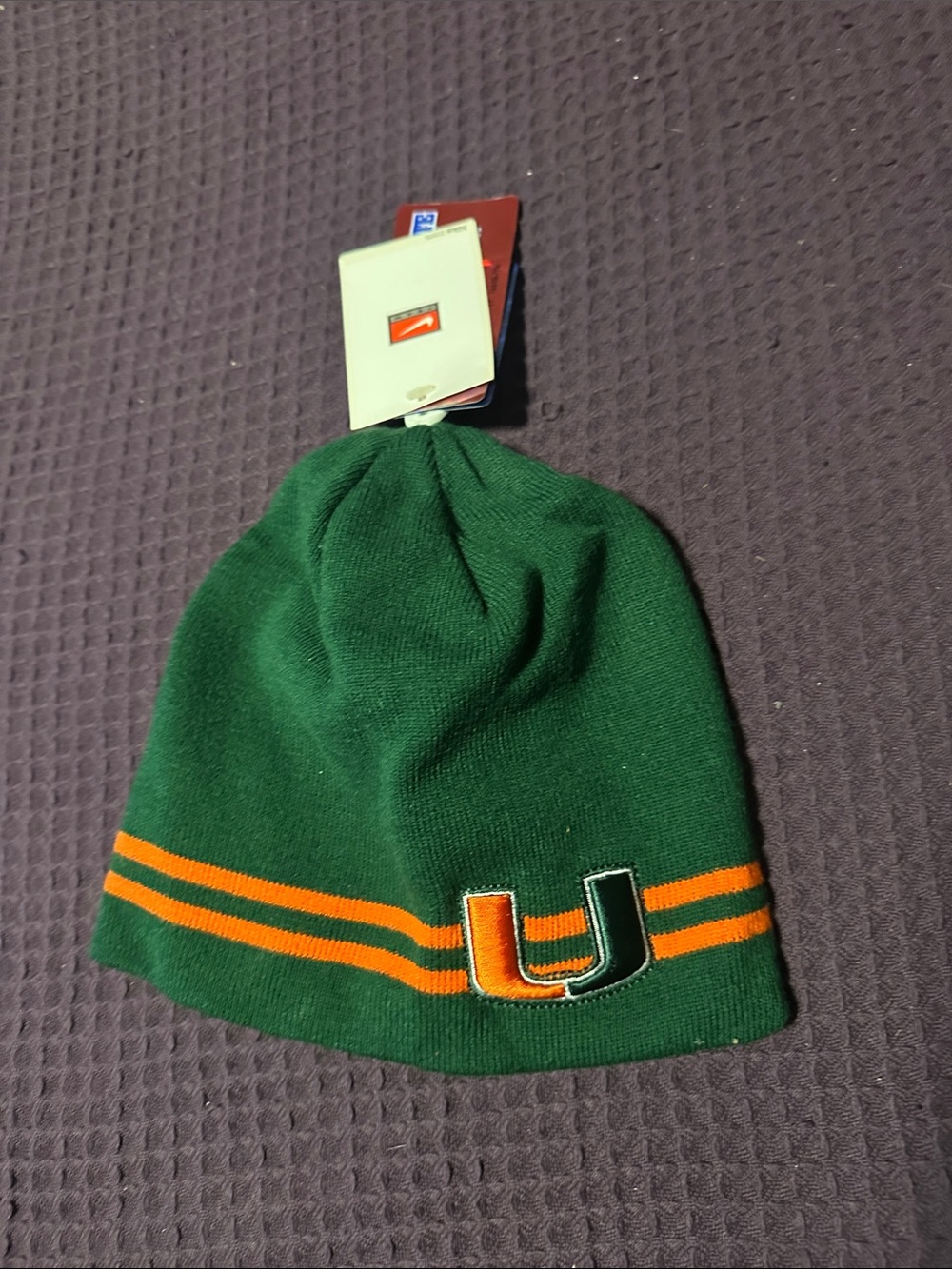 Nike Green Beanie with Orange Stripe and U Patch